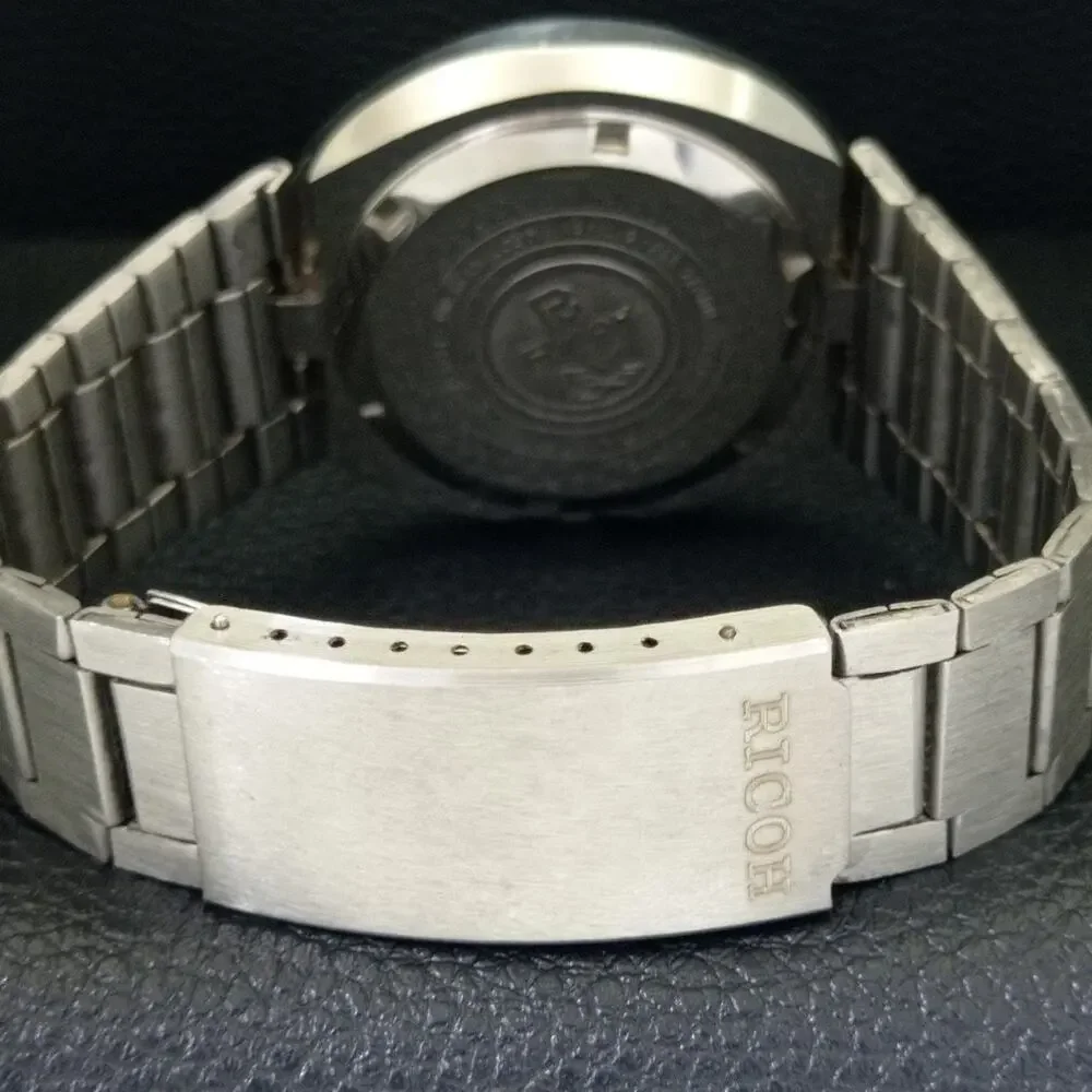 Vintage 1972 Ricoh Automatic Mens Silver Watch W/daydate & Red accents